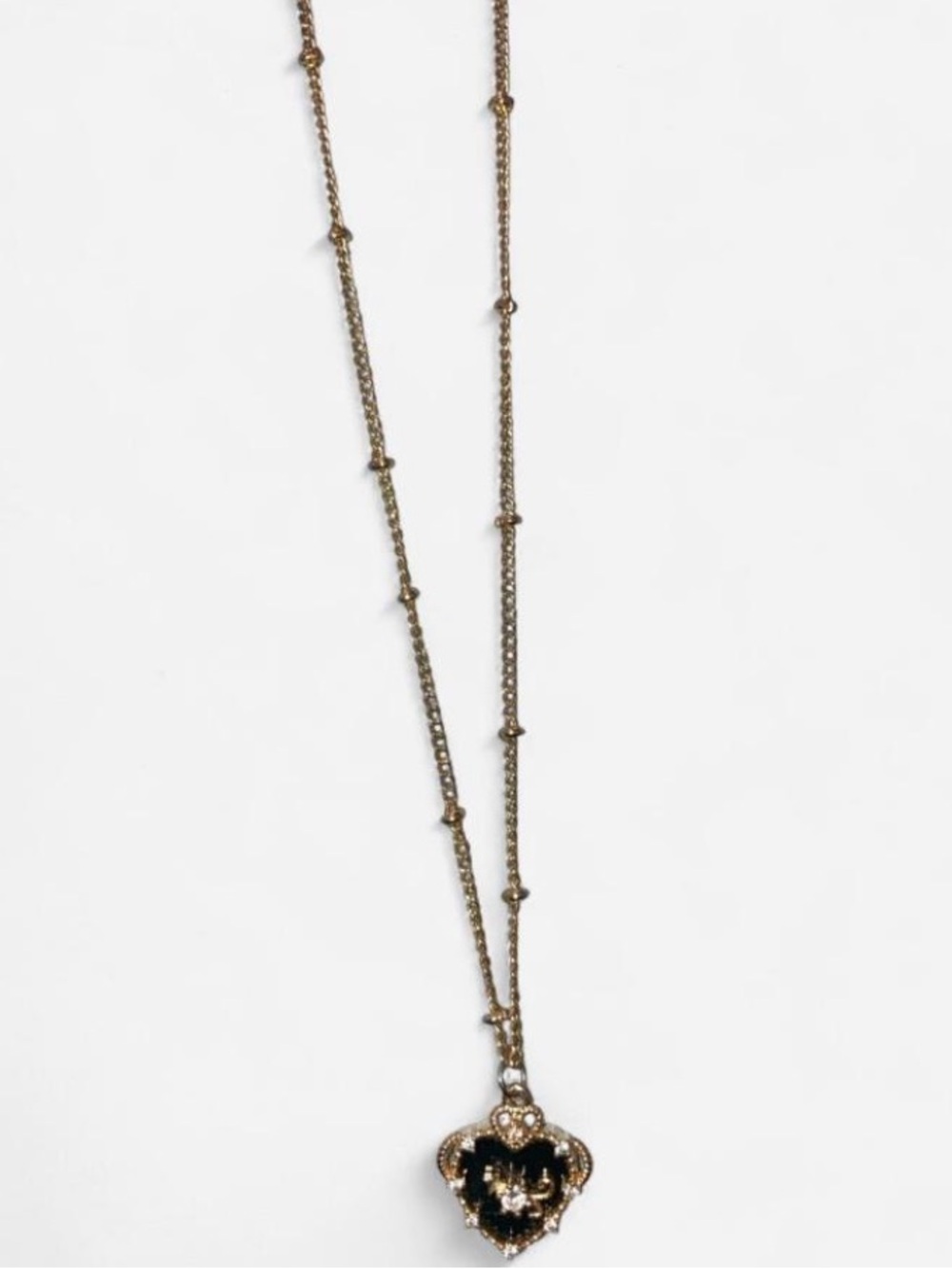Gold Heart Pendant Necklace with Black Enamel Accent